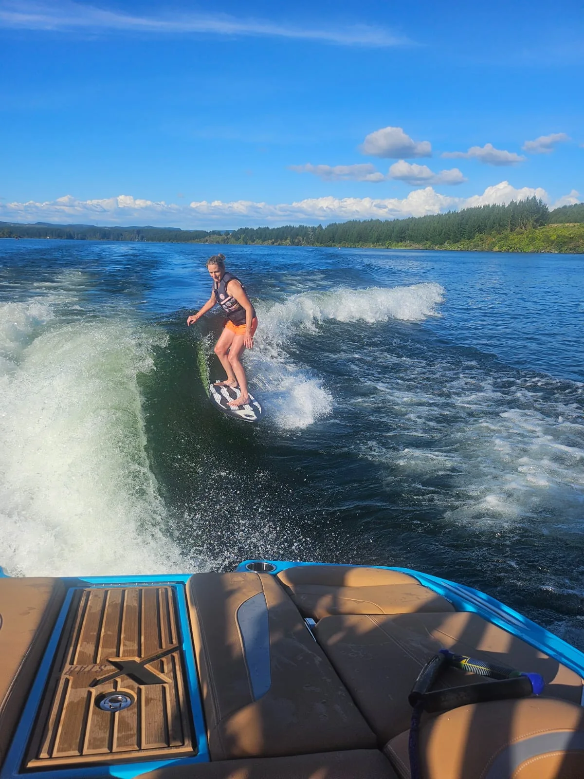 Close wakesurfing action beside the wake
